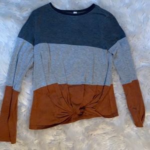 grey and orange long sleeve shirt